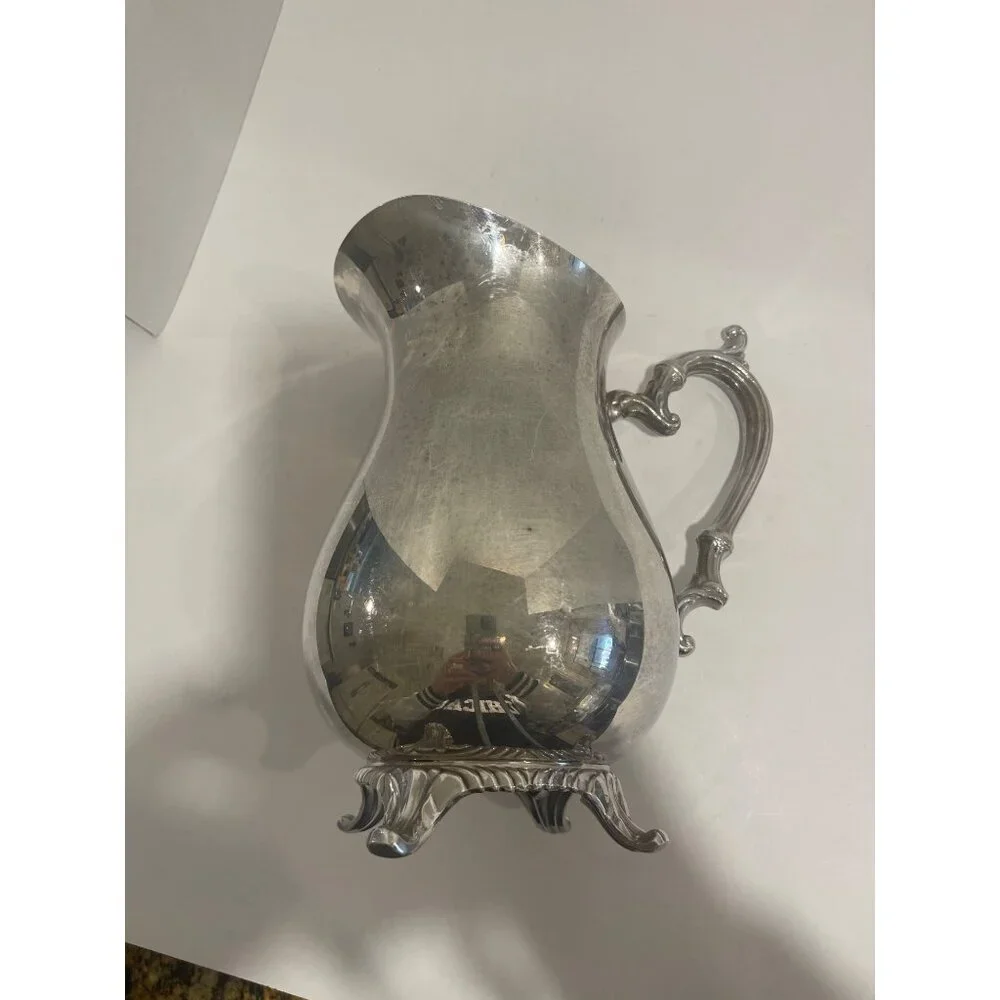 W.M. Rogers Silver Plated Water Pitcher With Guard Preowned in‎ good condition